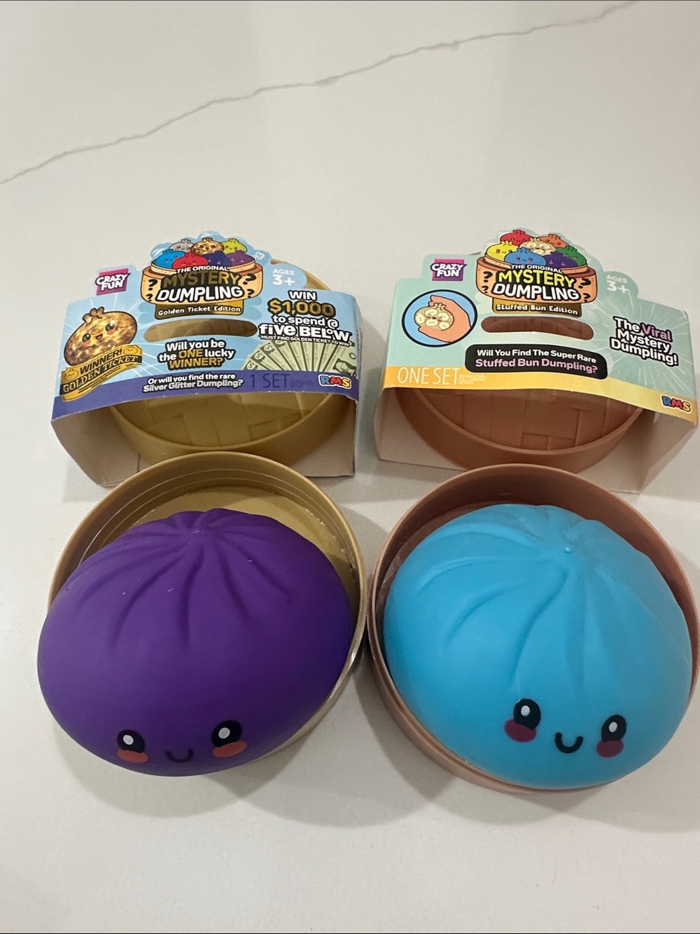 Set of 2 like new RMS Original Mystery Dumplings stuffed bun and golden edition